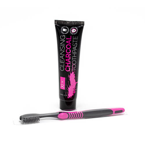 xoc-cleansing-charcoal-toothpaste-tube-toothbrush